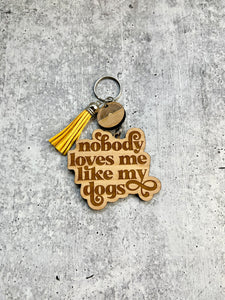 Nobody Loves Me Like My Dogs Keychain